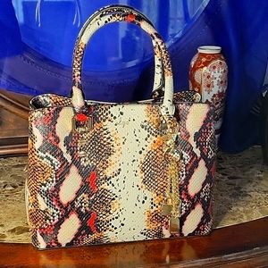 Aldo faux leather, snake pattern hand bag. Shoulder or crossbody style.